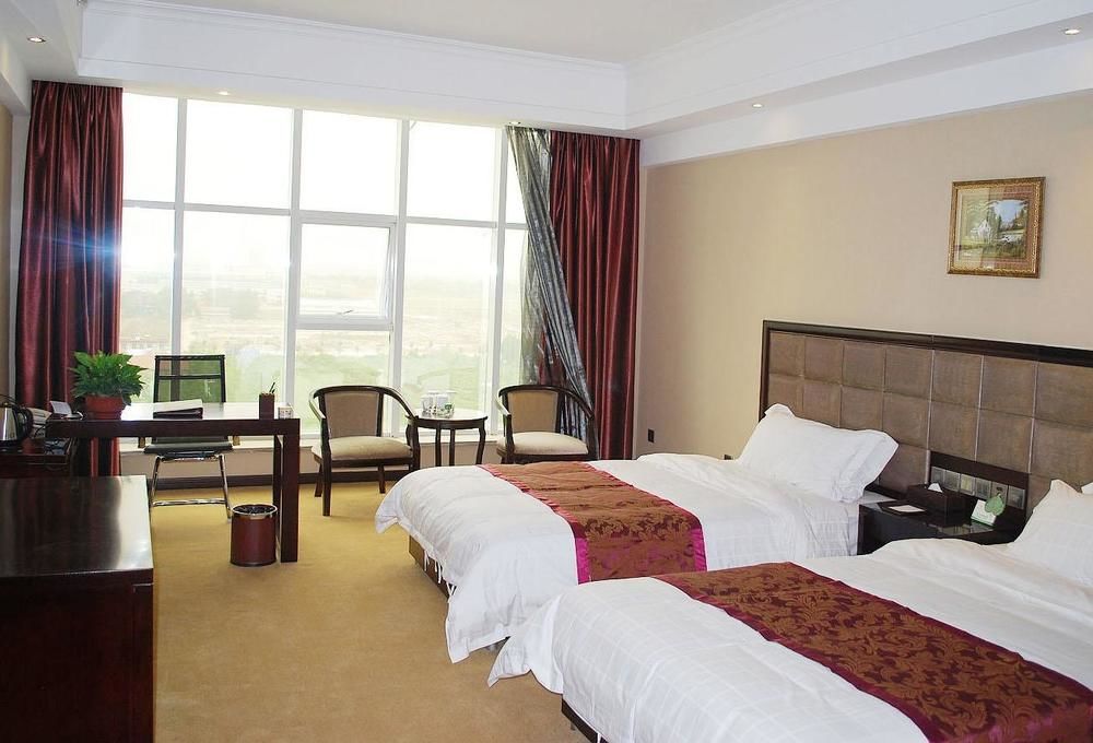 Weishi International Hotel Qing Zhou Eksteriør billede