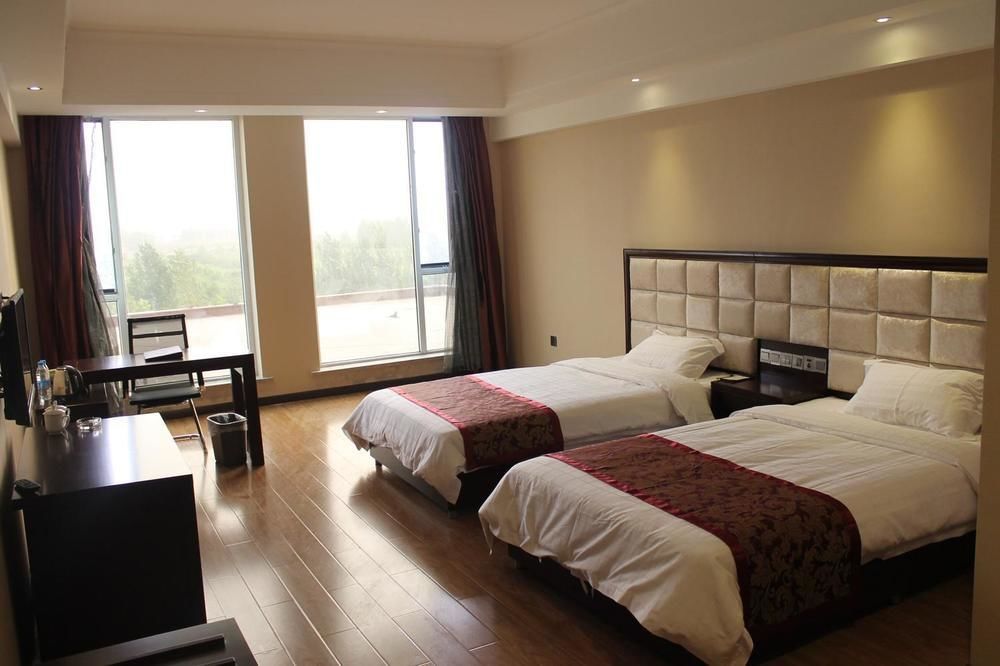 Weishi International Hotel Qing Zhou Eksteriør billede